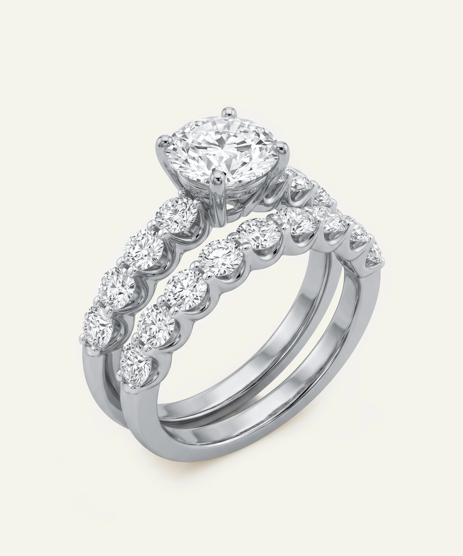 Diamond ring set on a light gray background