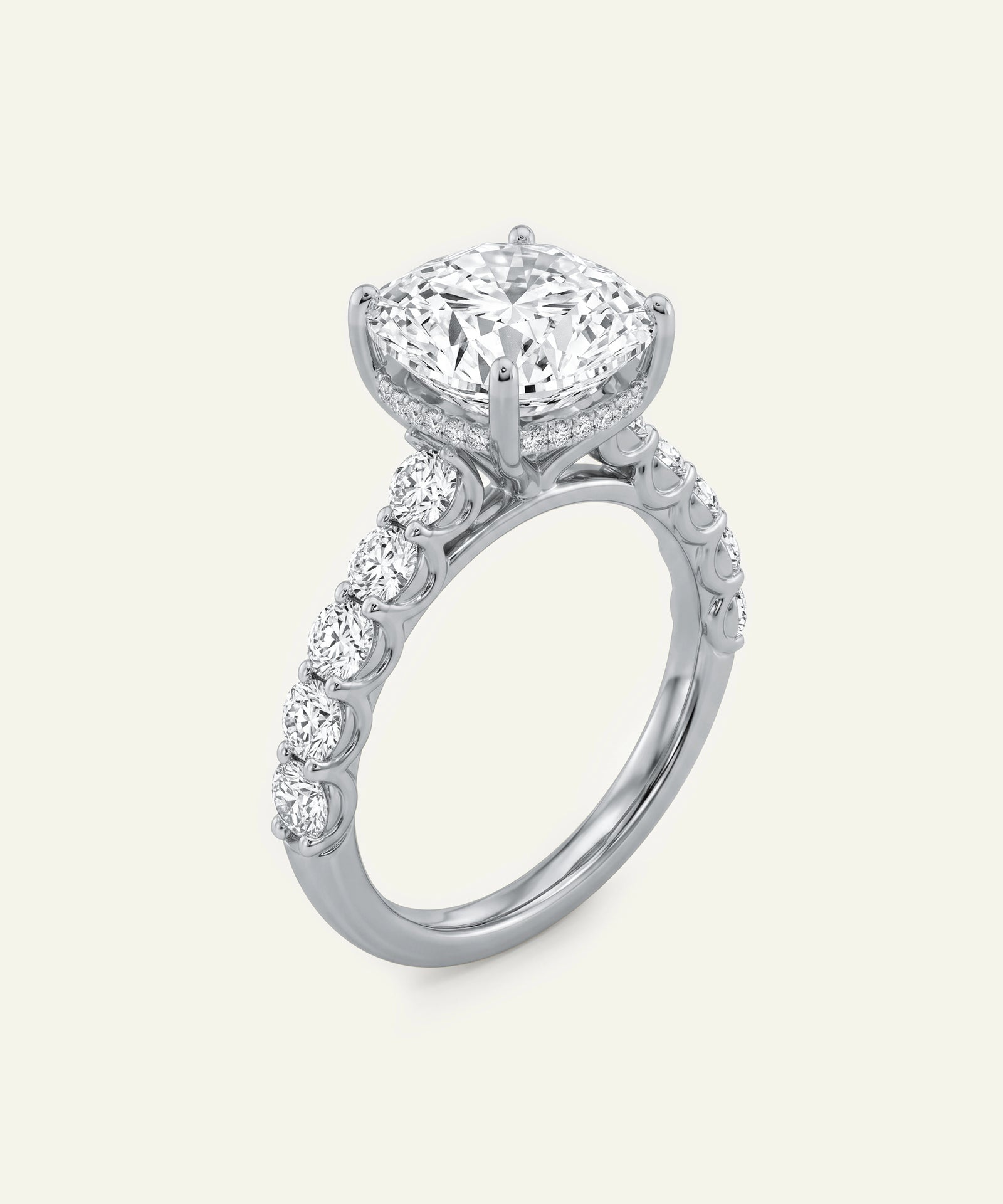 Diamond ring with a heart-shaped center stone on a white background