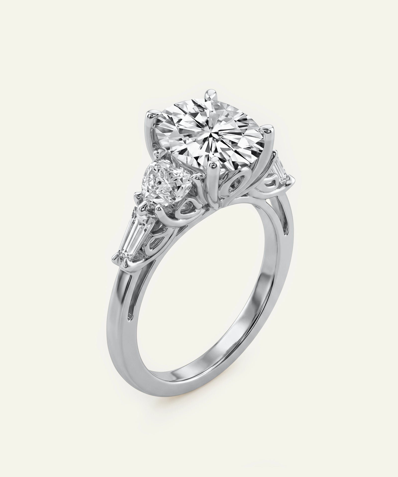 Diamond ring with two smaller diamonds on a white background
