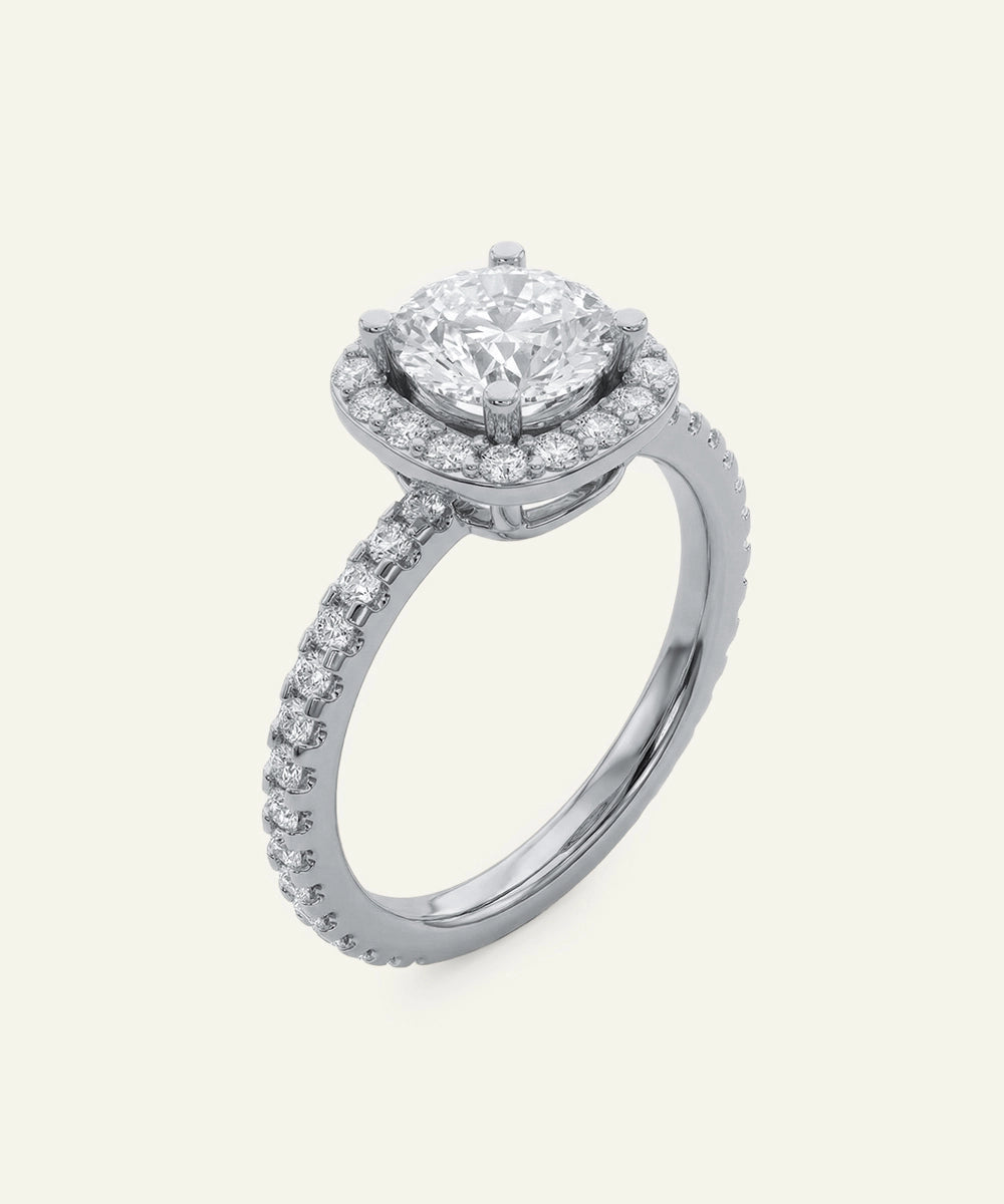 Silver ring with a large diamond on a white background