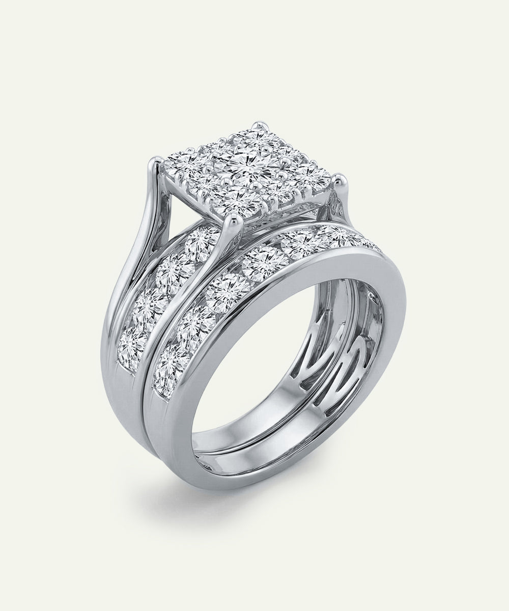 Diamond ring with a white gemstone on a light gray background