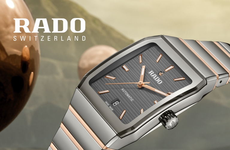 Rado Switzerland automatic two-tone watch with rectangular dial and rose gold accents
